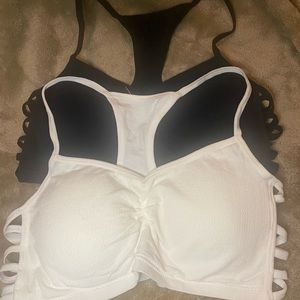 1 black and 1 white bralettes/sports bra. Tried on but never worn.
